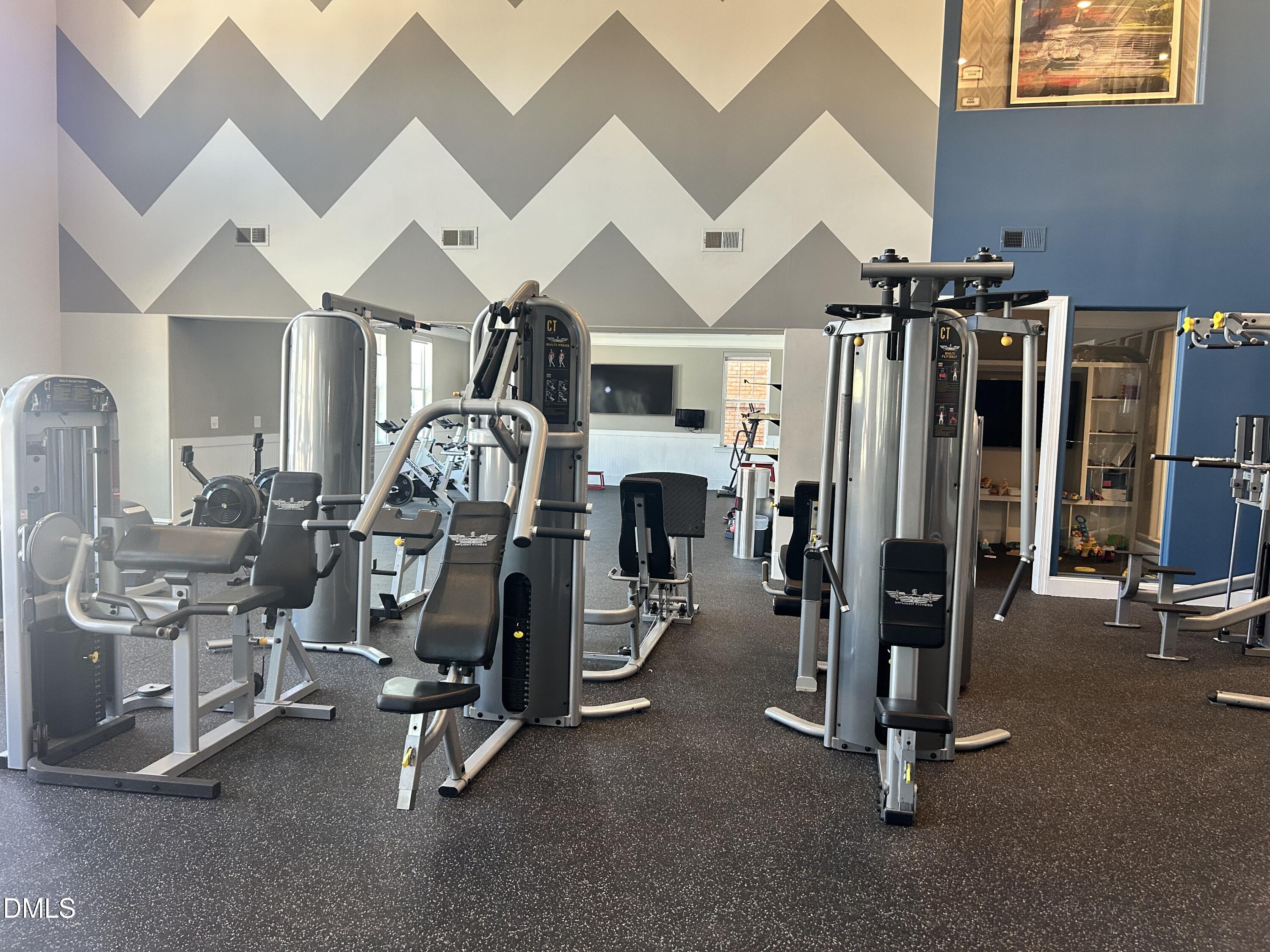 372 Amber Acorn Avenue Raleigh, NC 27603 - Photo 36 of 49 a view of a room with gym equipment