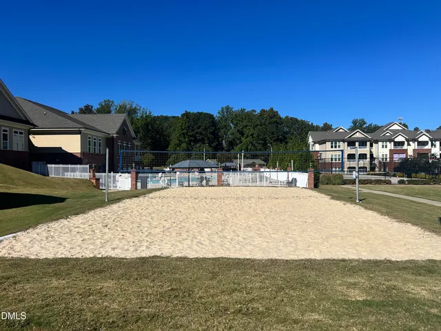 a view of an empty room with windows