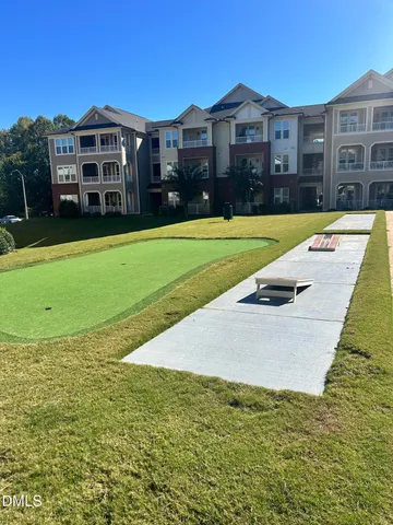 a view of a workspace with furniture