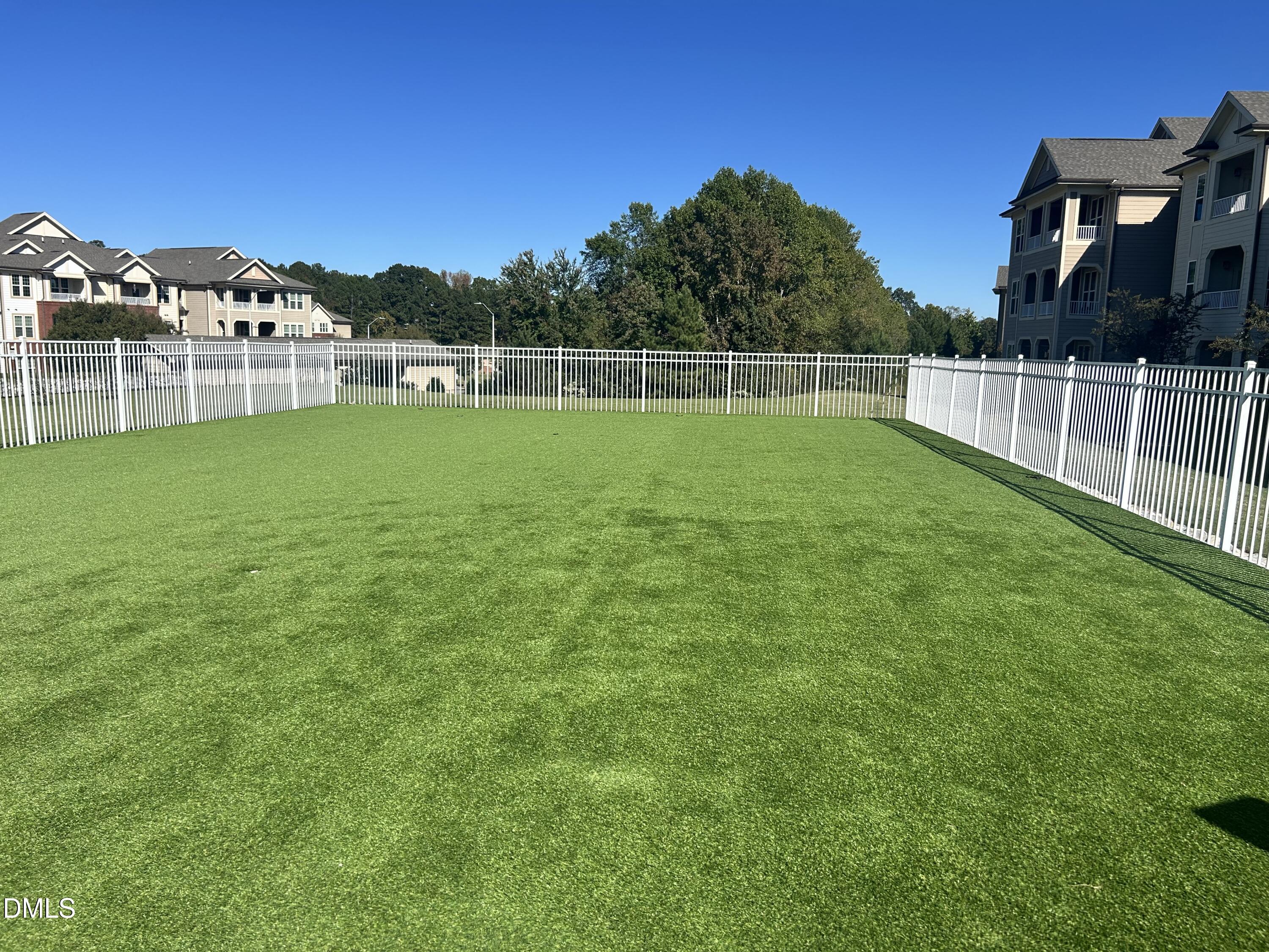 372 Amber Acorn Avenue Raleigh, NC 27603 - Photo 45 of 49 a view of a field with a big yard
