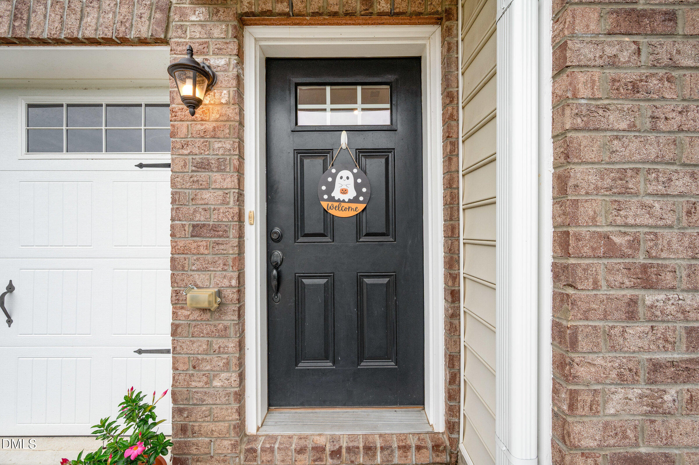 372 Amber Acorn Avenue Raleigh, NC 27603 - Photo 3 of 49 a front view of a house with a door