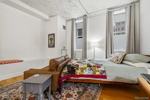 a view of a living room and bathroom