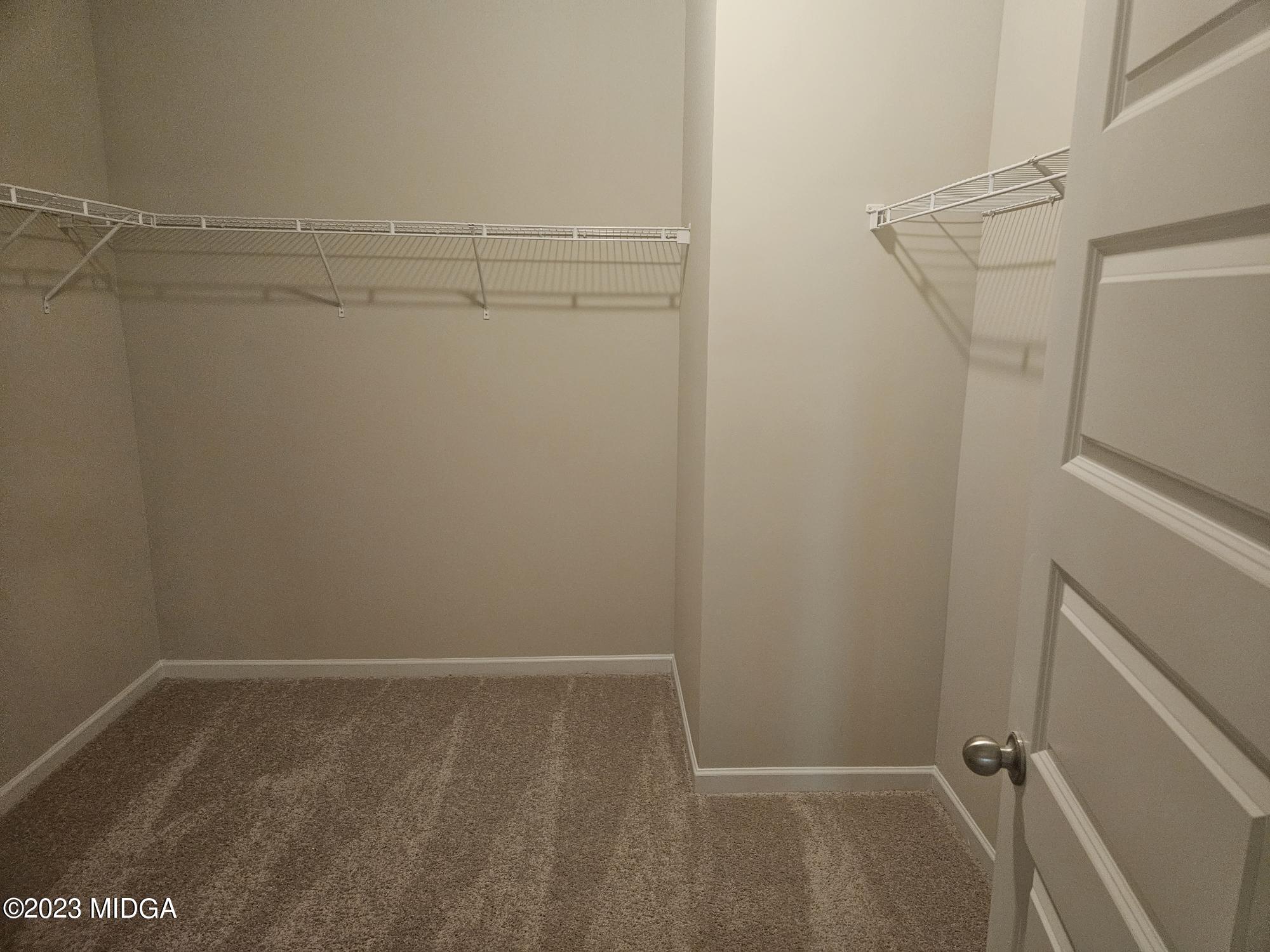231 Presidents Way Forsyth, GA 31029 - Photo 16 of 32 a view of small space with racks on the wall