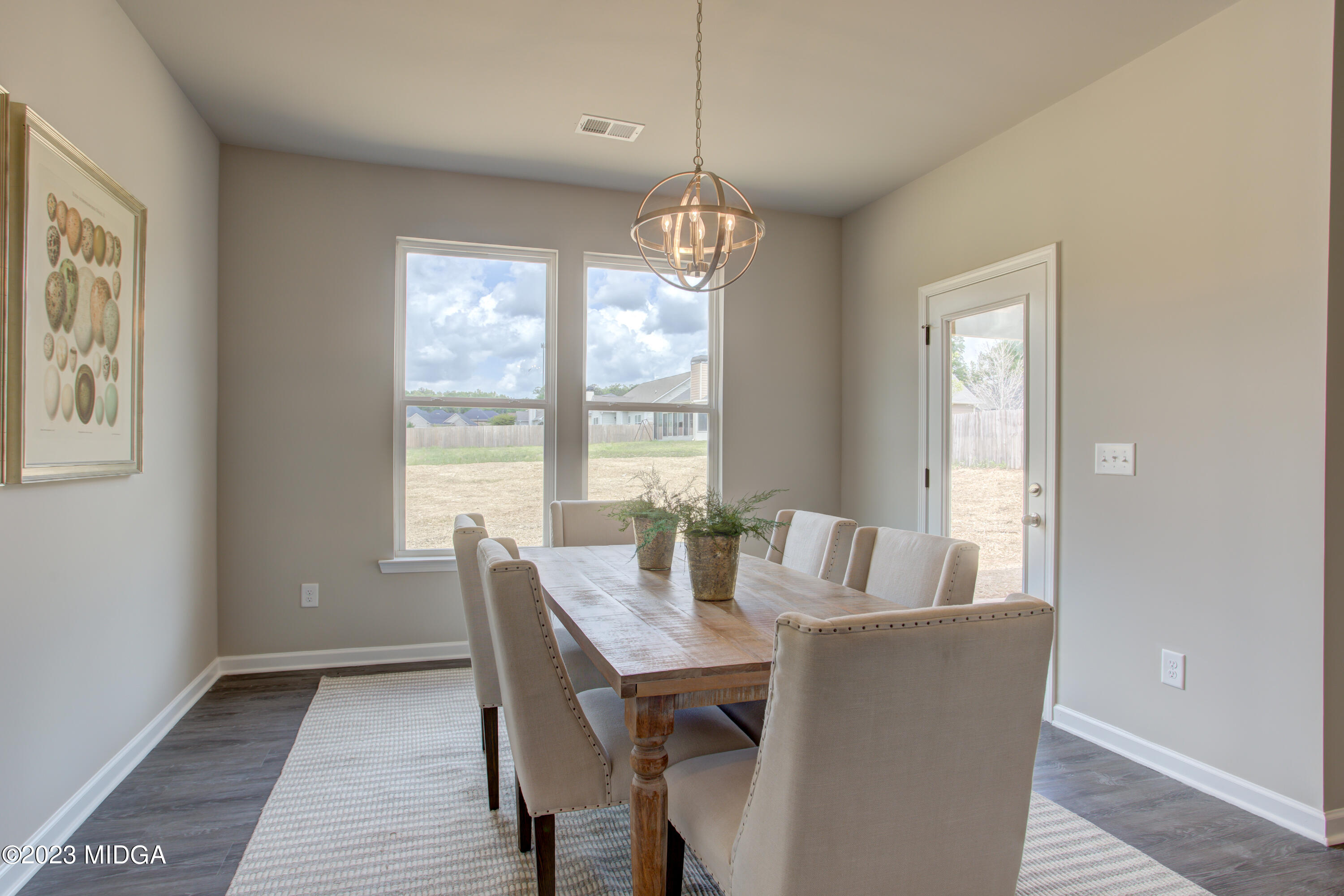 231 Presidents Way Forsyth, GA 31029 - Photo 9 of 32 a view of a dining room with furniture window and outside view