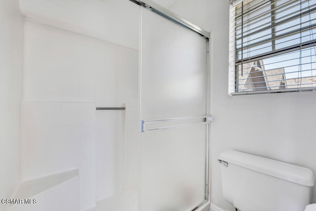 1854 Rory Lane, Unit 6 Simi Valley, CA 93063 - Photo 16 of 26 a bathroom with a toilet and a shower