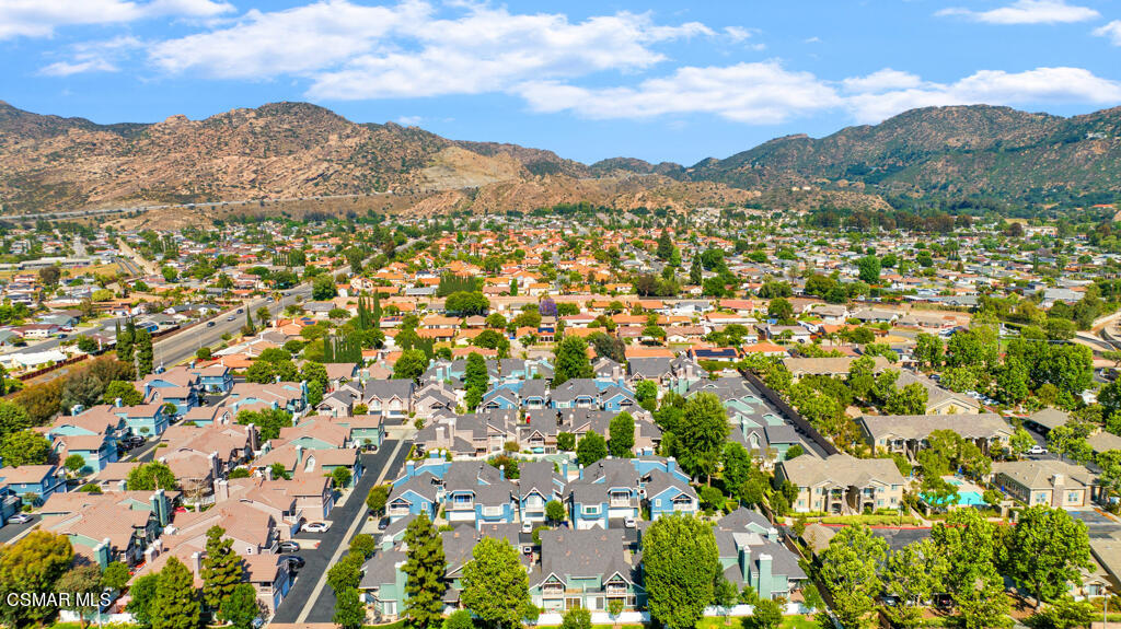 1854 Rory Lane, Unit 6 Simi Valley, CA 93063 - Photo 25 of 26 a view of a city with mountains in the background