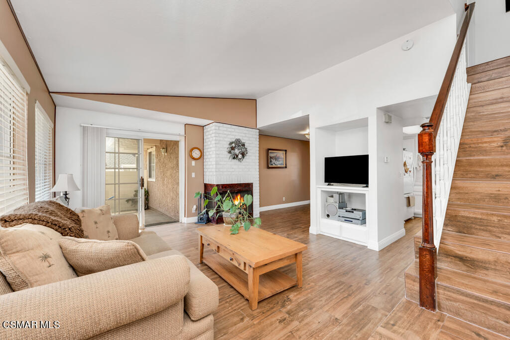 1854 Rory Lane, Unit 6 Simi Valley, CA 93063 - Photo 4 of 26 a living room with furniture and a flat screen tv