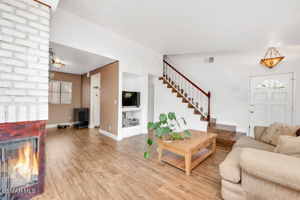 1854 Rory Lane, Unit 6 Simi Valley, CA 93063 - Photo 6 of 26 a living room with furniture and wooden floor