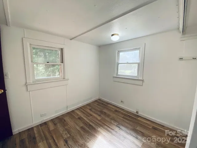 a view of a room that has a window