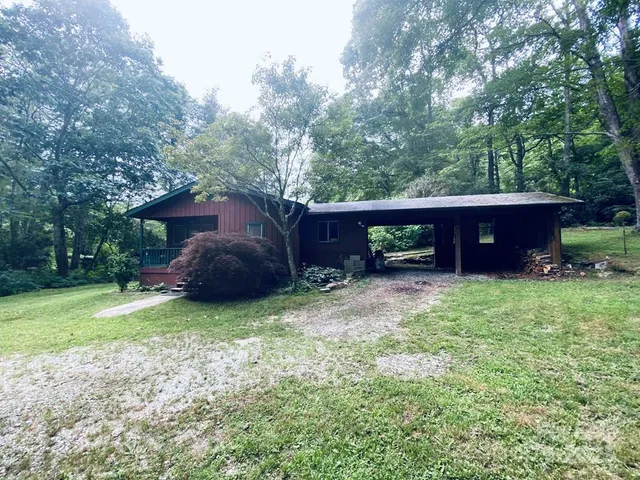 a view of backyard with green space