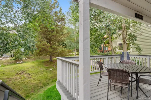 a view of a patio on wooden deck