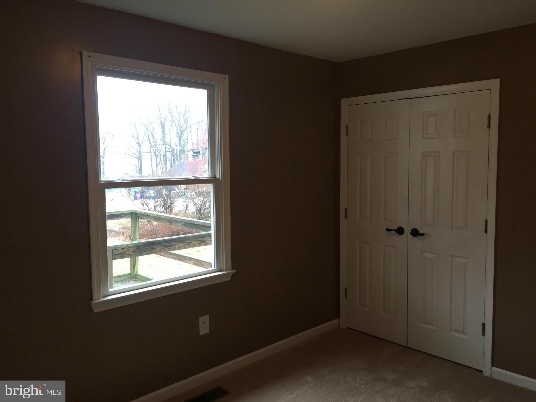 7700 Edgewood Church Road Frederick, MD 21702 - Photo 9 of 24 a view of an empty room and a window