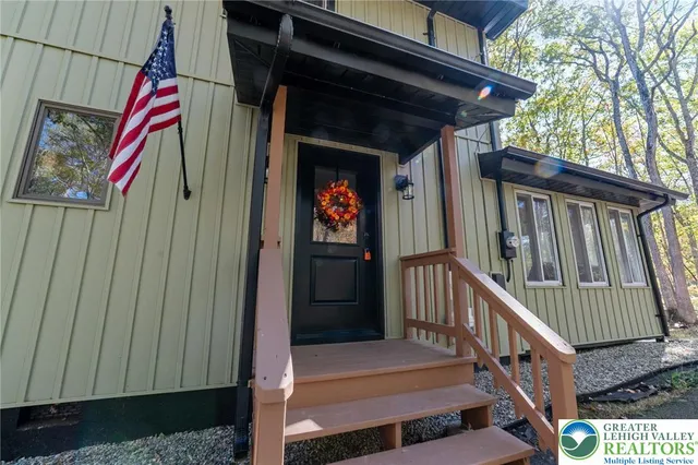 a view of a lake with a bench and lake view