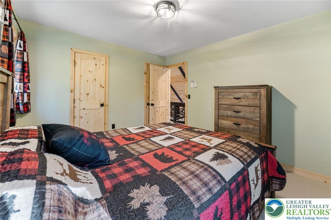 809 Boulder Court North Hawley, PA 18428 - Photo 35 of 43 a bedroom with a bed and a closet