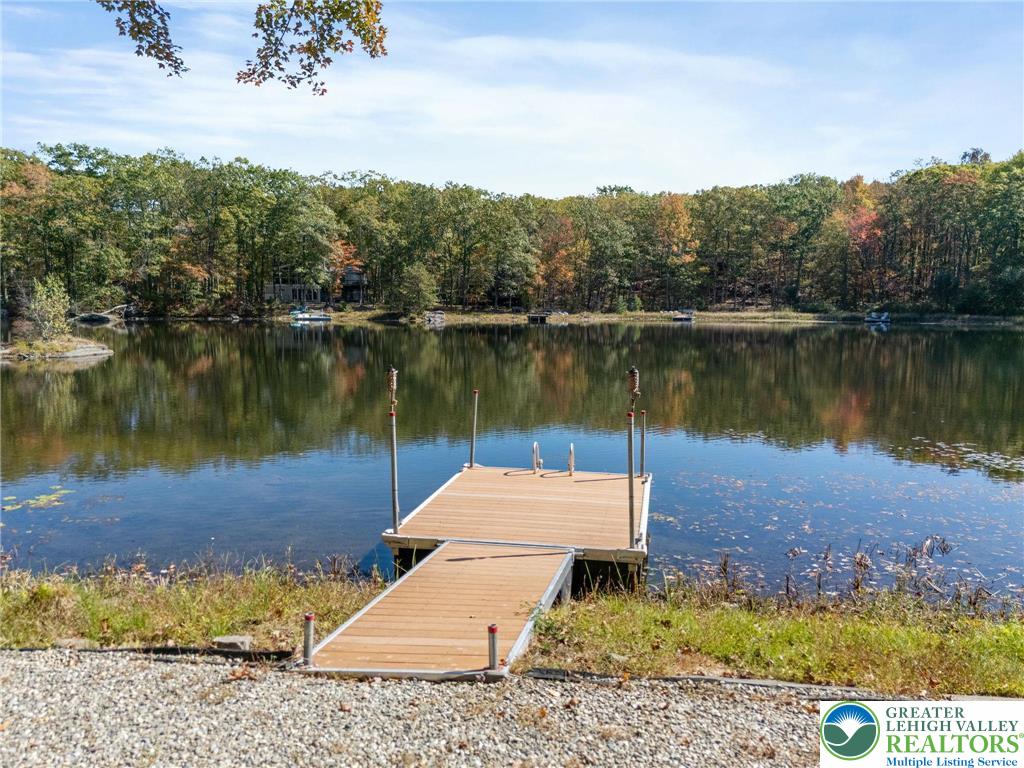 809 Boulder Court North Hawley, PA 18428 - Photo 43 of 43 a view of a lake with a mountain in the background