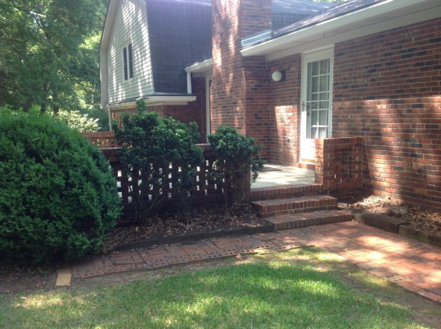 7601 Whittle Road Macon, GA 31220 - Photo 3 of 23 a front view of a house with a yard