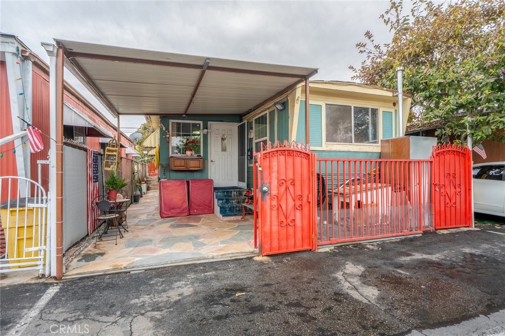 16002 Atlantic Avenue, Unit C11 Compton, CA 90221 - Photo 1 of 19 a view of back yard of the house