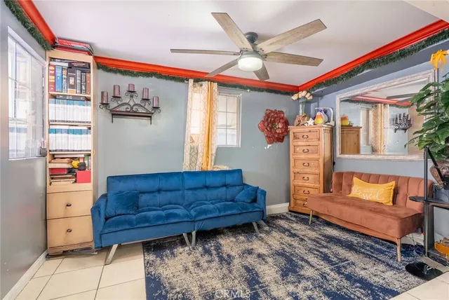 a living room with furniture and a rug