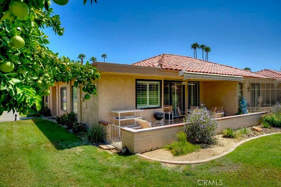 8 Cadiz Drive Rancho Mirage, CA 92270 - Photo 17 of 26 a front view of house with yard and outdoor seating