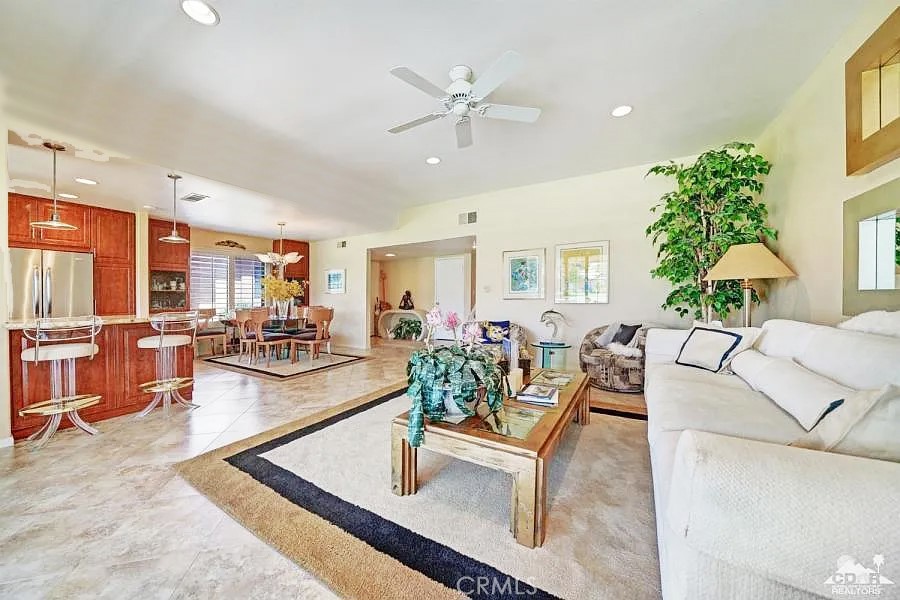 8 Cadiz Drive Rancho Mirage, CA 92270 - Photo 2 of 26 a living room with furniture and a large window