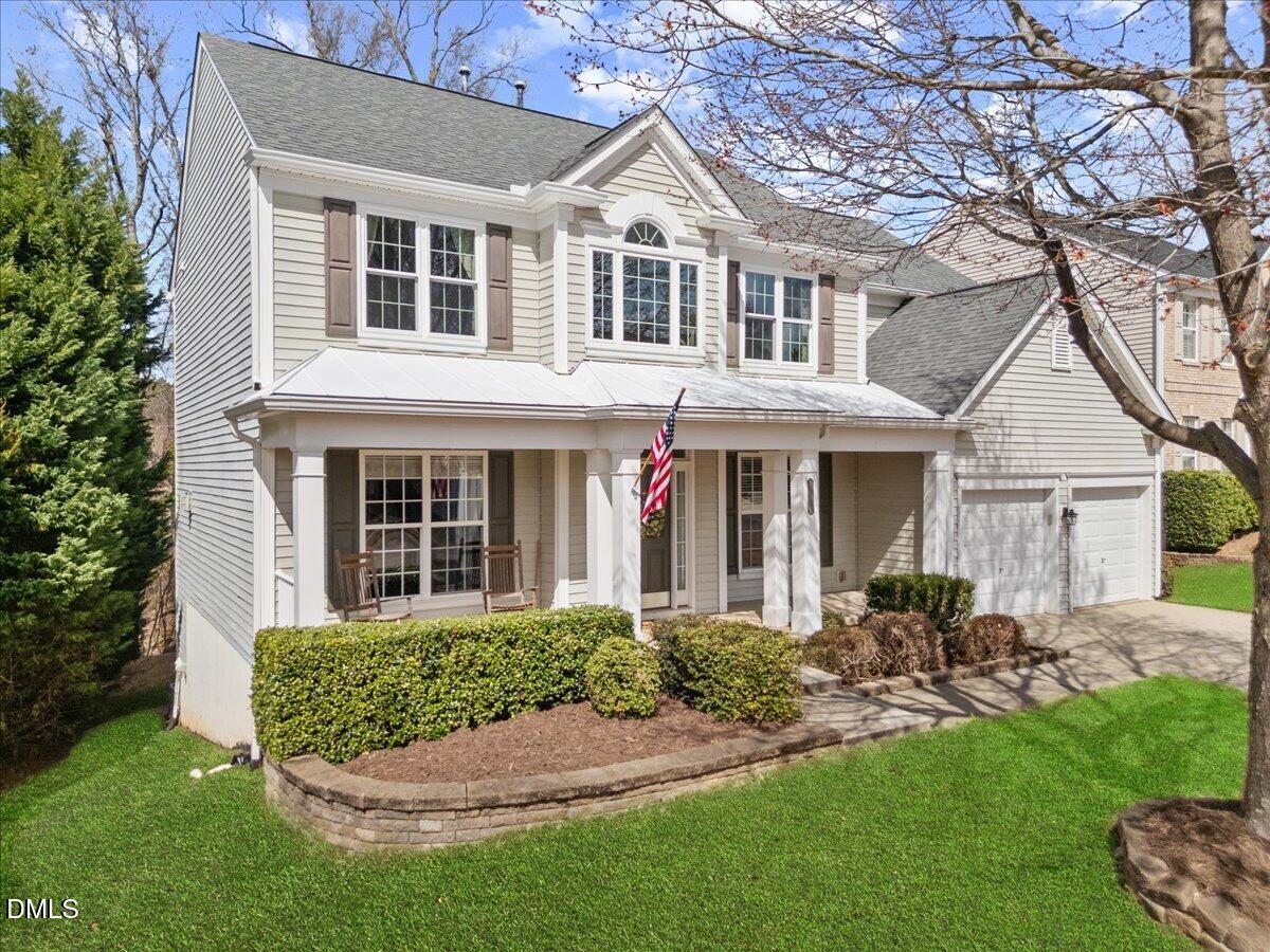 7728 Silver View Lane Raleigh, NC 27613 - Photo 2 of 53 a front view of a house with a yard
