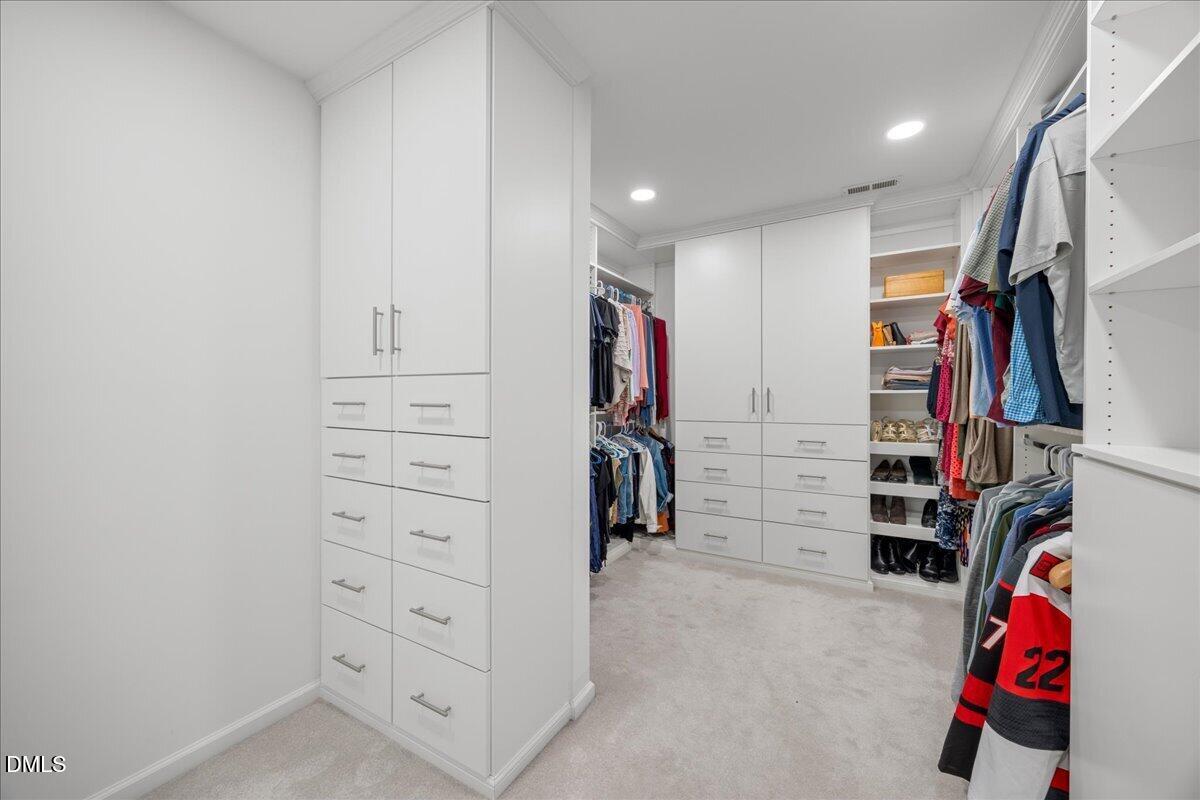 7728 Silver View Lane Raleigh, NC 27613 - Photo 28 of 53 a view of walk in closet with clothes