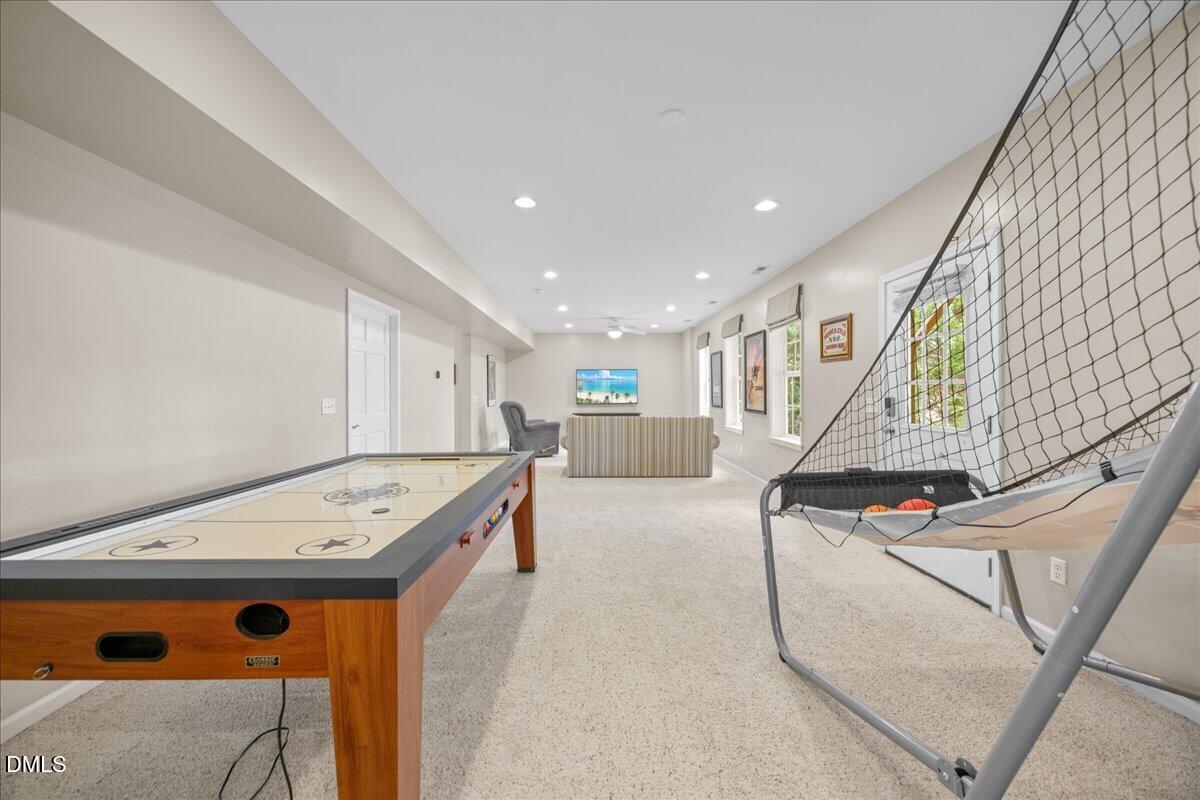 7728 Silver View Lane Raleigh, NC 27613 - Photo 38 of 53 a living room with stainless steel appliances kitchen island granite countertop furniture and a view of kitchen