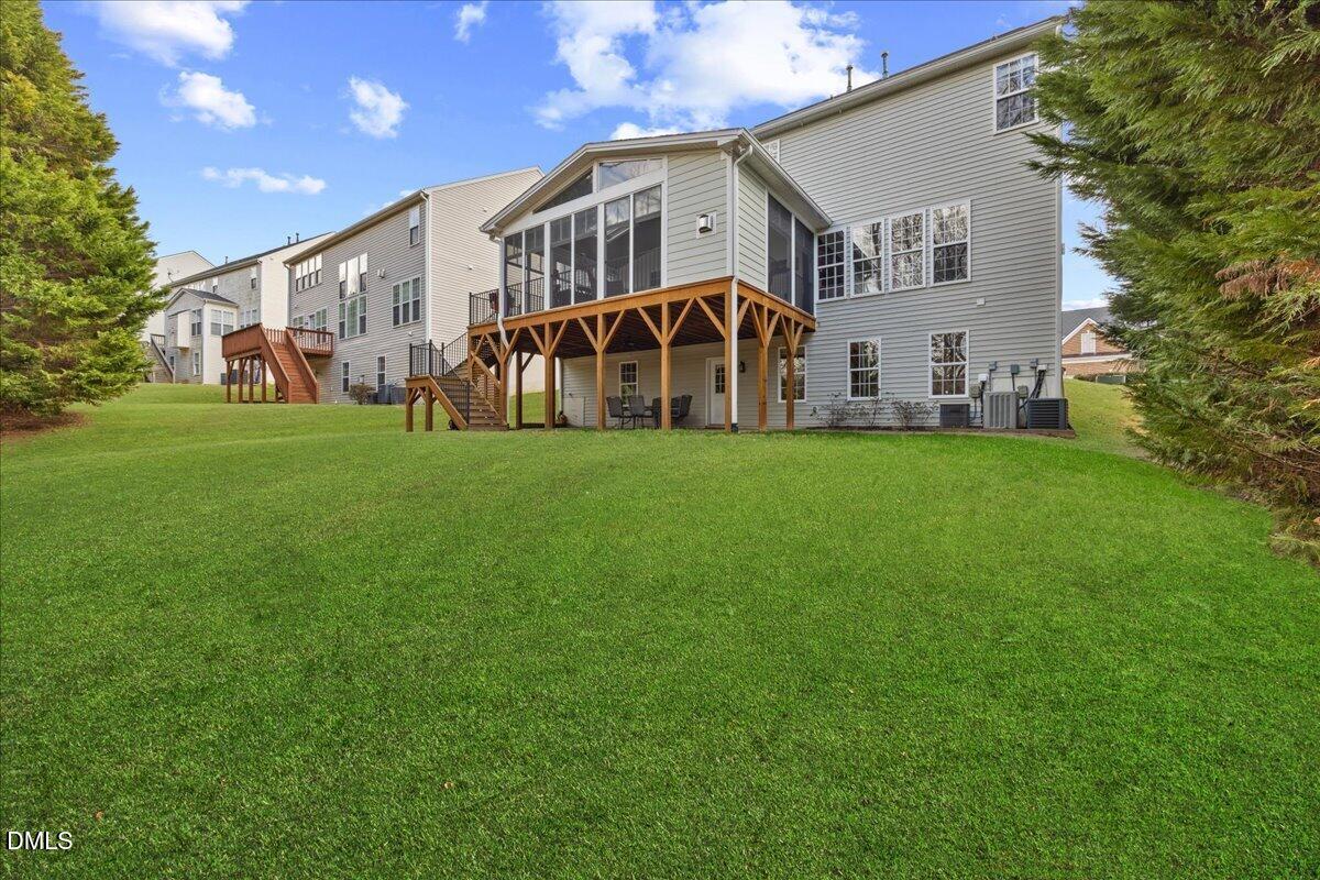 7728 Silver View Lane Raleigh, NC 27613 - Photo 43 of 53 a view of a yard in front of a house