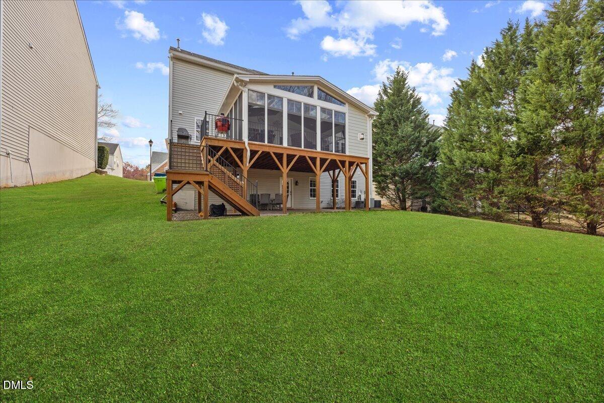 7728 Silver View Lane Raleigh, NC 27613 - Photo 44 of 53 a view of a house with a yard