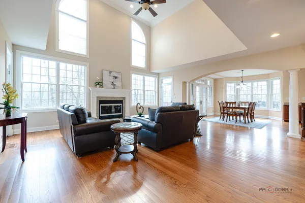a view of a dining room with furniture window and wooden floor