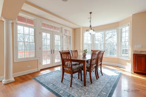 a kitchen with stainless steel appliances granite countertop a stove a refrigerator and a sink