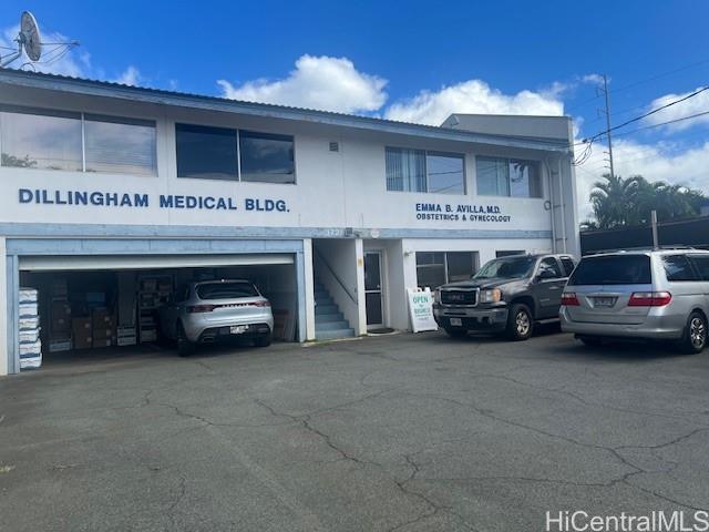 1728 Dillingham Boulevard, Unit B Honolulu, HI 96819 - Photo 1 of 15 a view of a car garage