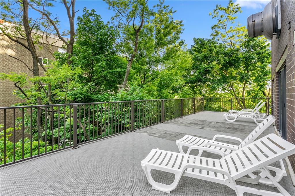 5600 Munhall Road, Unit 816 Pittsburgh, PA 15217 - Photo 20 of 20 a view of a deck with a chair