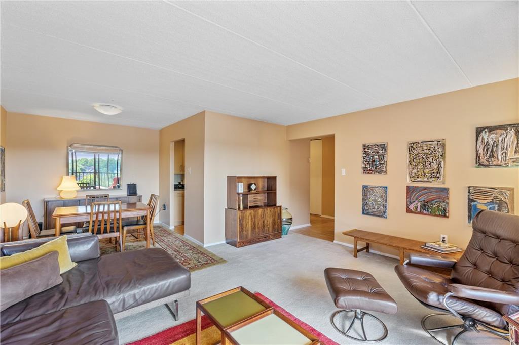 5600 Munhall Road, Unit 816 Pittsburgh, PA 15217 - Photo 4 of 20 a living room with furniture and a window