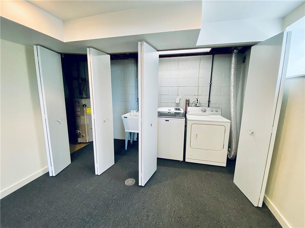 27 Flora Road Pittsburgh, PA 15227 - Photo 14 of 19 a utility room with dryer and washer