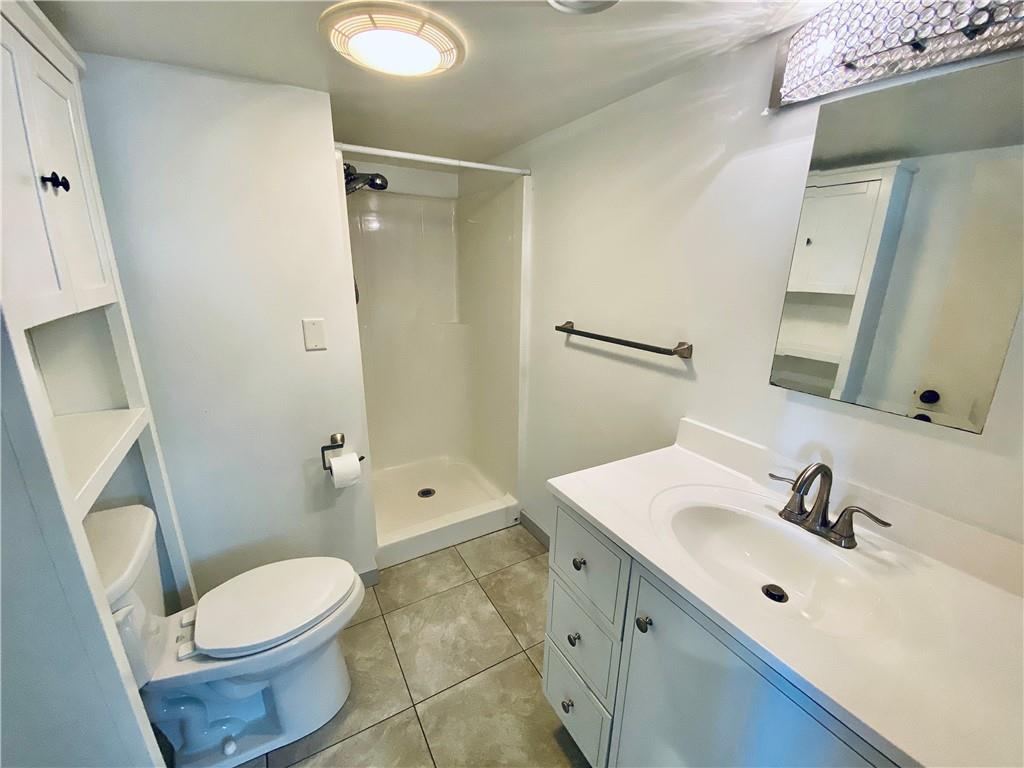 27 Flora Road Pittsburgh, PA 15227 - Photo 15 of 19 a bathroom with a sink toilet and shower