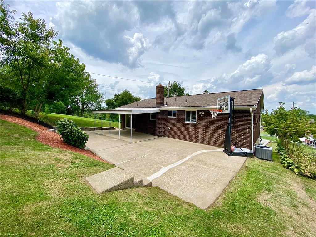 27 Flora Road Pittsburgh, PA 15227 - Photo 18 of 19 a view of outdoor space yard deck and patio