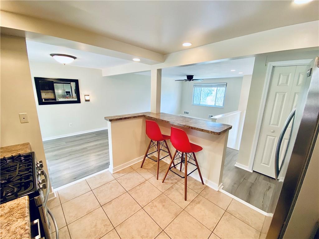 27 Flora Road Pittsburgh, PA 15227 - Photo 9 of 19 a workspace with furniture and a window