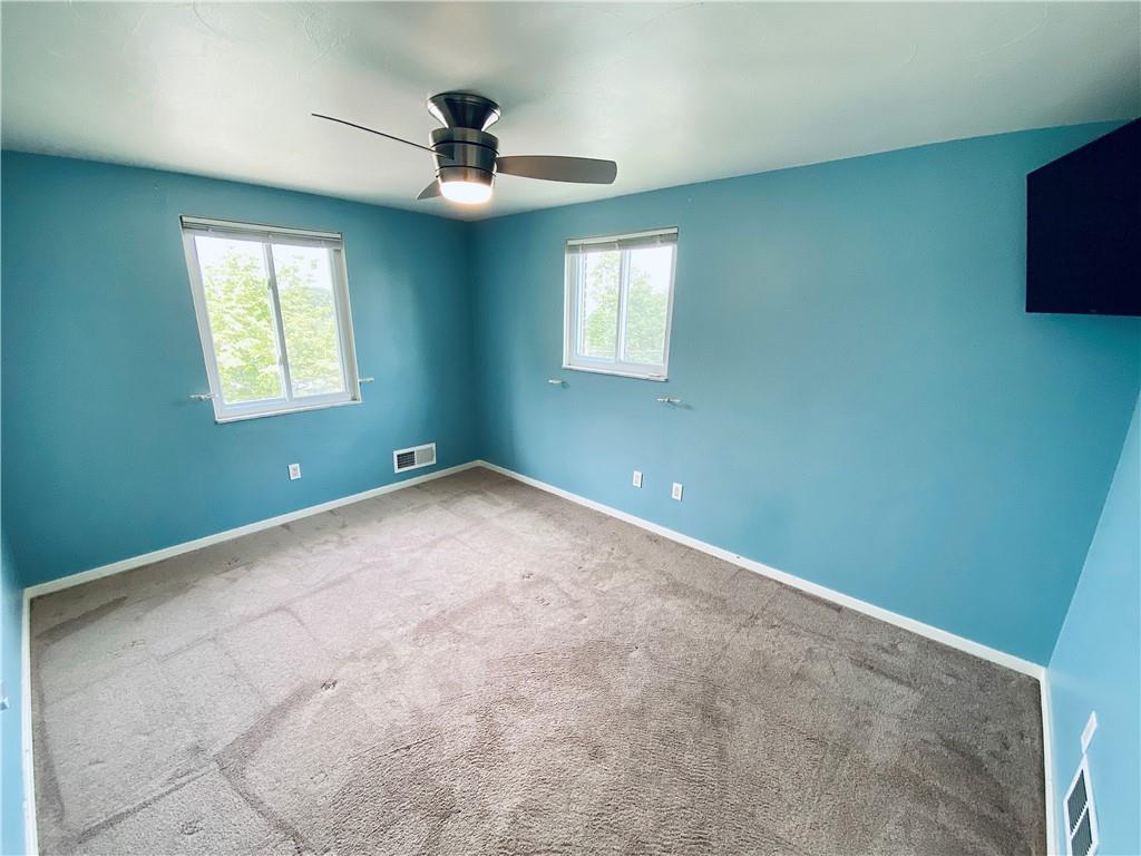 27 Flora Road Pittsburgh, PA 15227 - Photo 10 of 19 a view of an empty room with a window