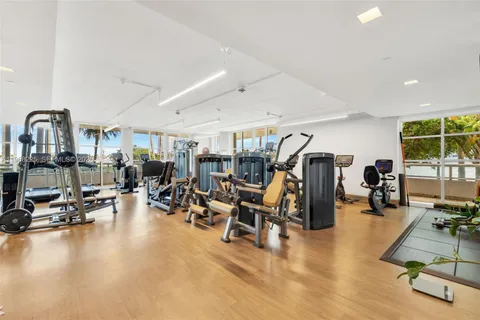 a view of a swimming pool with a garden and plants