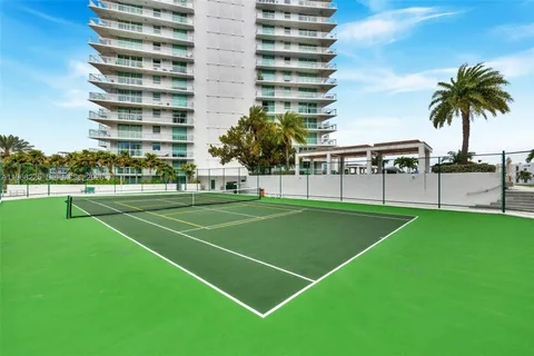 aerial view of a house with garden and patio