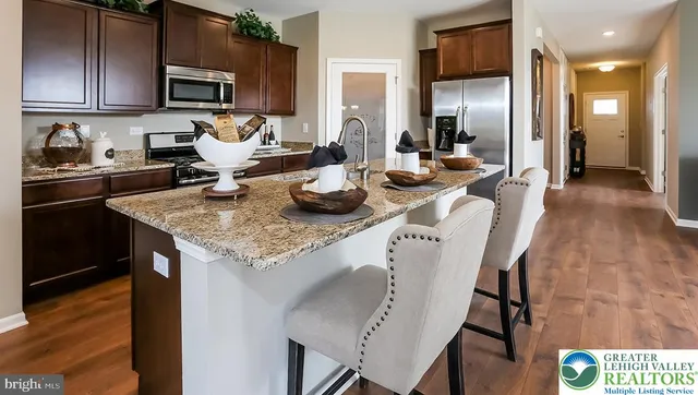 a kitchen with granite countertop lots of counter top space