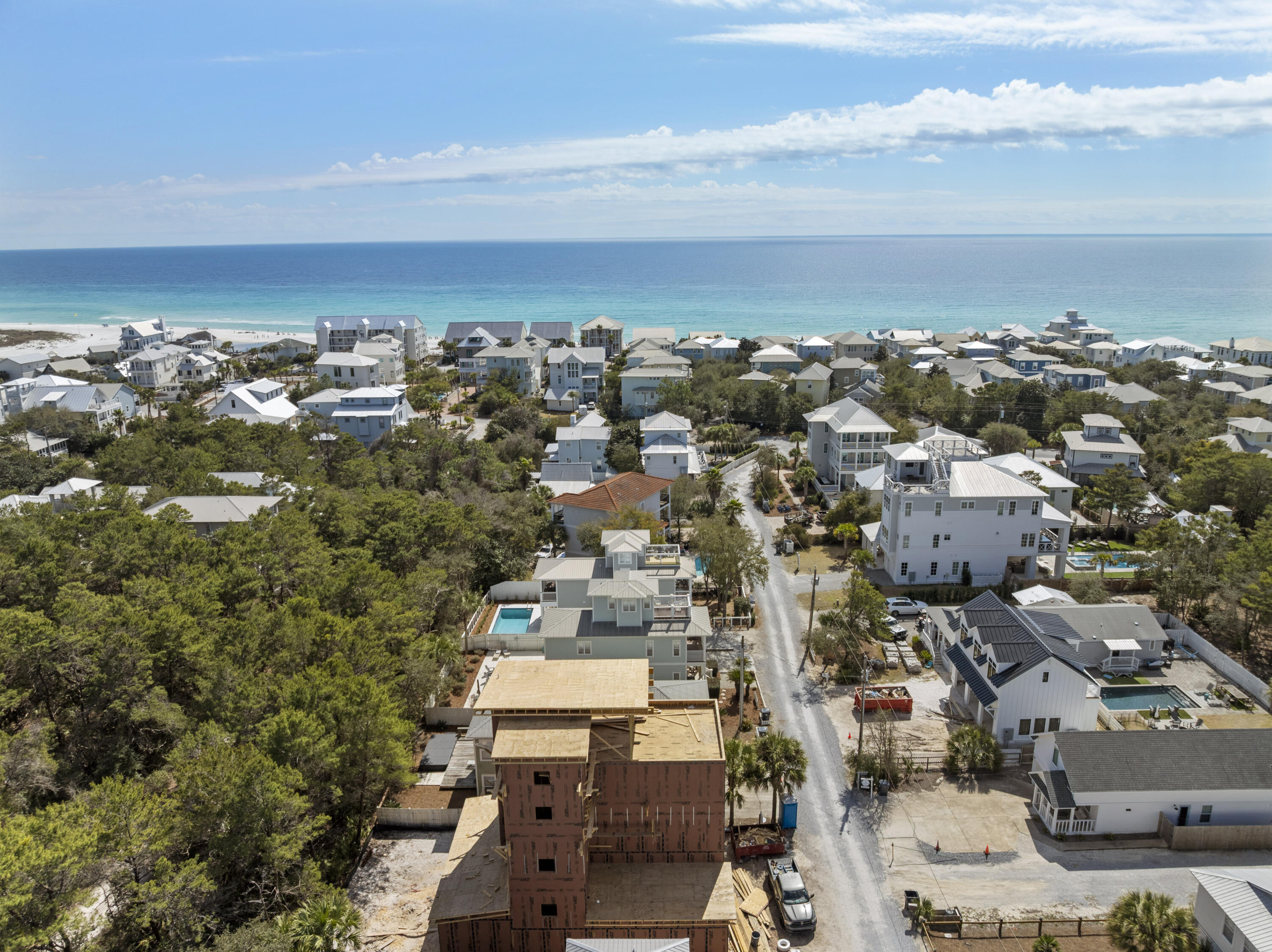 74 Brown Street Santa Rosa Beach, FL 32459 - Photo 9 of 35 an aerial view of a city with lots of residential buildings and ocean view