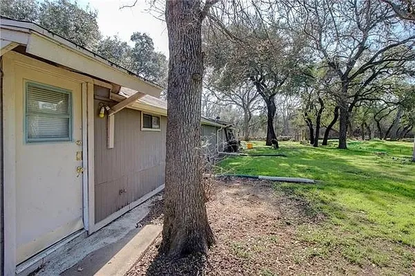 a view of field with trees
