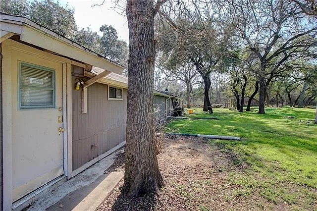 3800 Allegro Lugar Street, Unit 3B Austin, TX 78749 - Photo 10 of 11 a view of a house with a yard