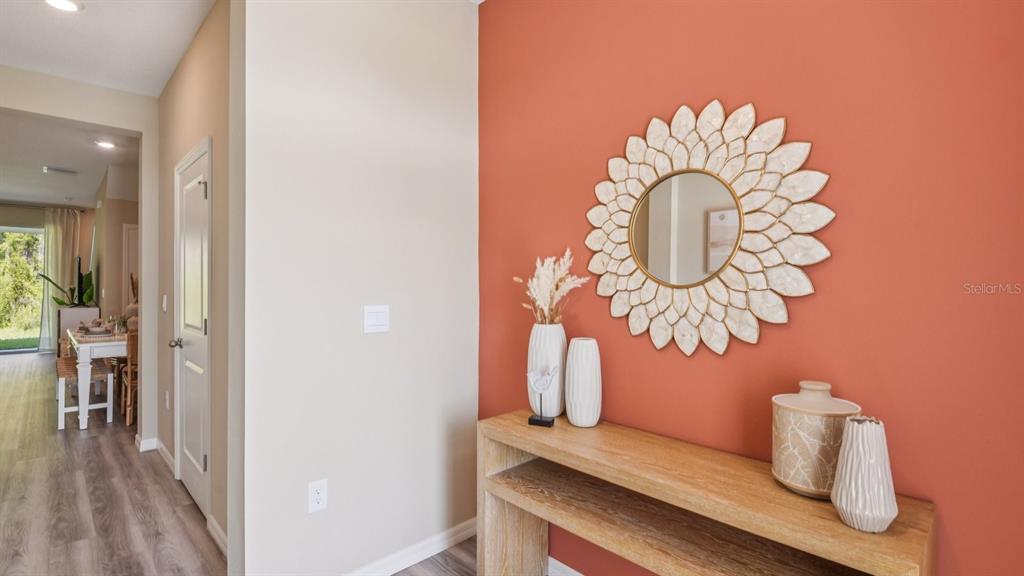 32471 Welling Blade Loop Wesley Chapel, FL 33545 - Photo 16 of 42 a vase of flowers sitting on a table