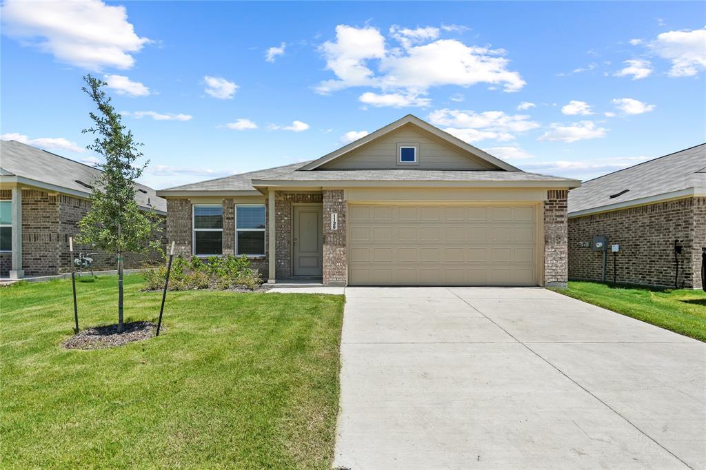 1138 Barbary Flds Street Forney, TX 75126 - Photo 1 of 25 Single-story residence featuring a brick and siding exterior, an attached two-car garage, and a concrete driveway