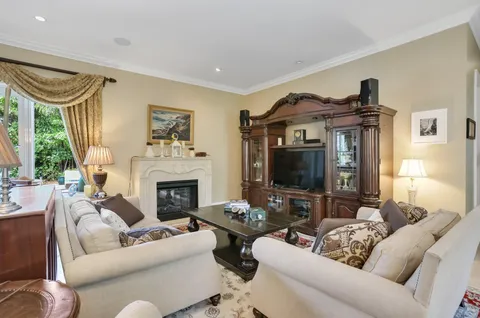 a very nice looking room with a large window and glass door