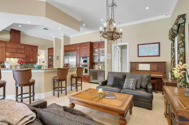 a kitchen with lots of counter top space and stainless steel appliances