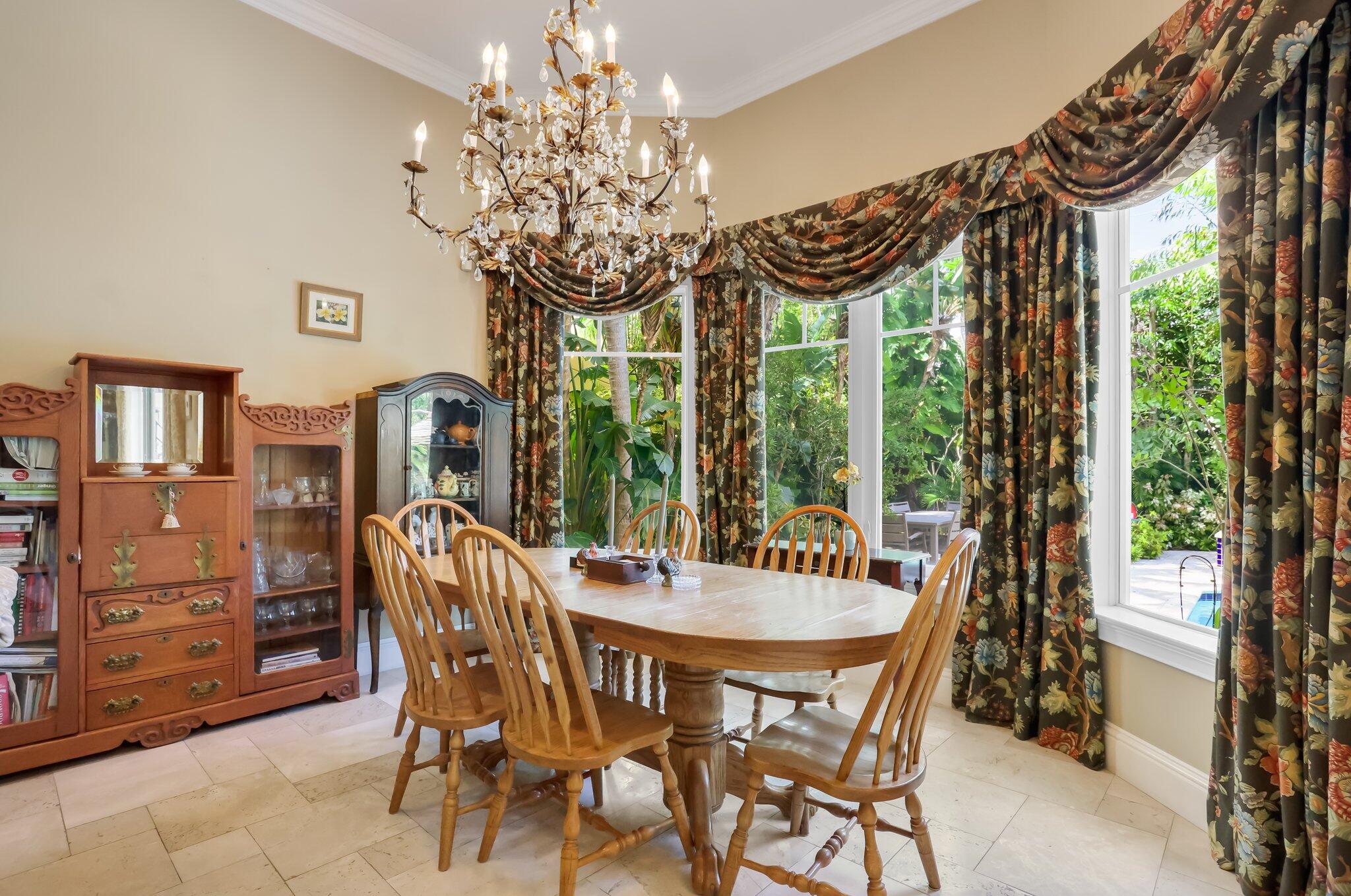 2409 Northeast 12th Street Fort Lauderdale, FL 33304 - Photo 14 of 65 a view of a dining room with furniture window and outside view